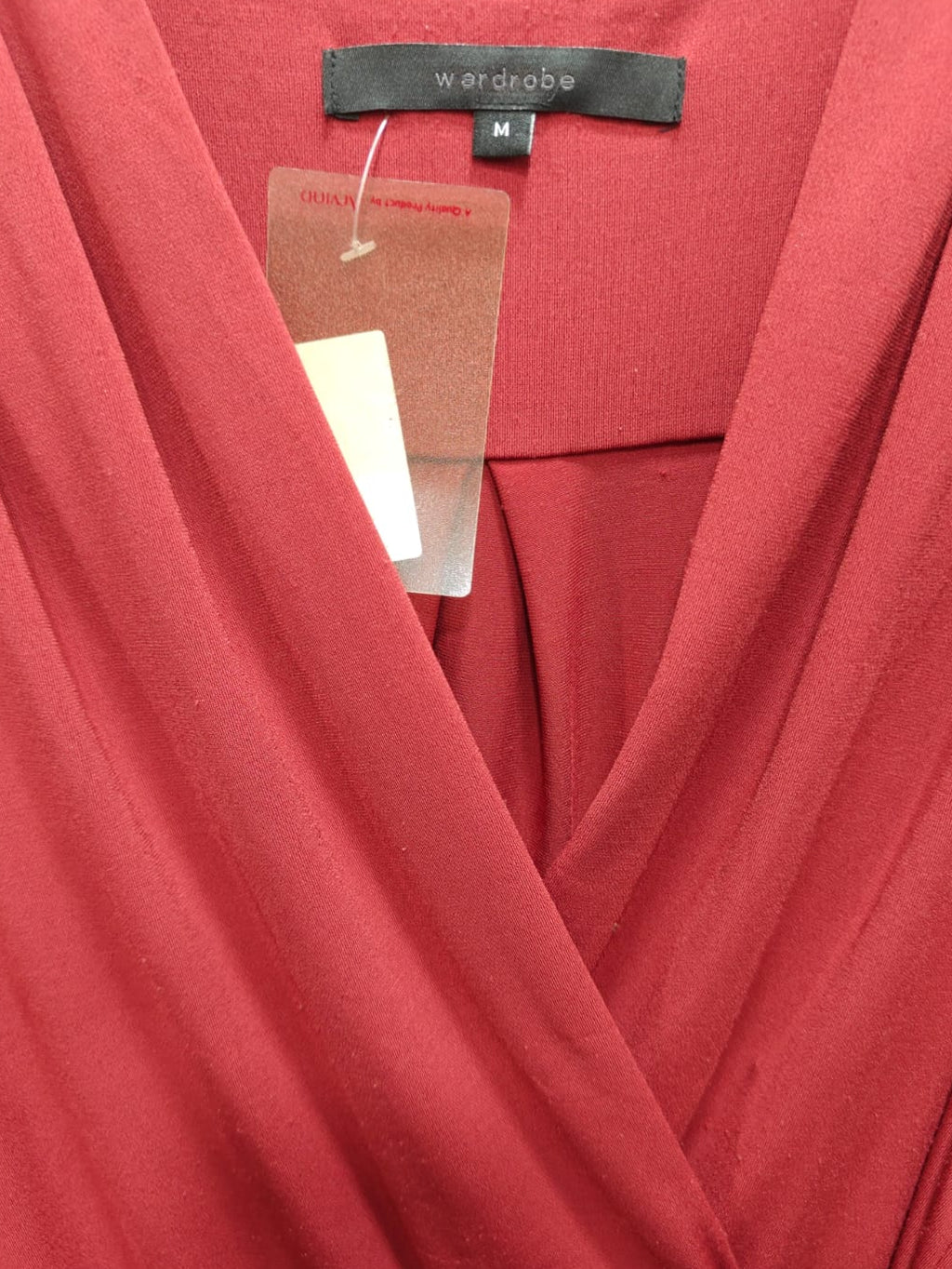 Wardrobe Women's Red V-Neck Sleeveless Jumpsuit with Tie-Waist