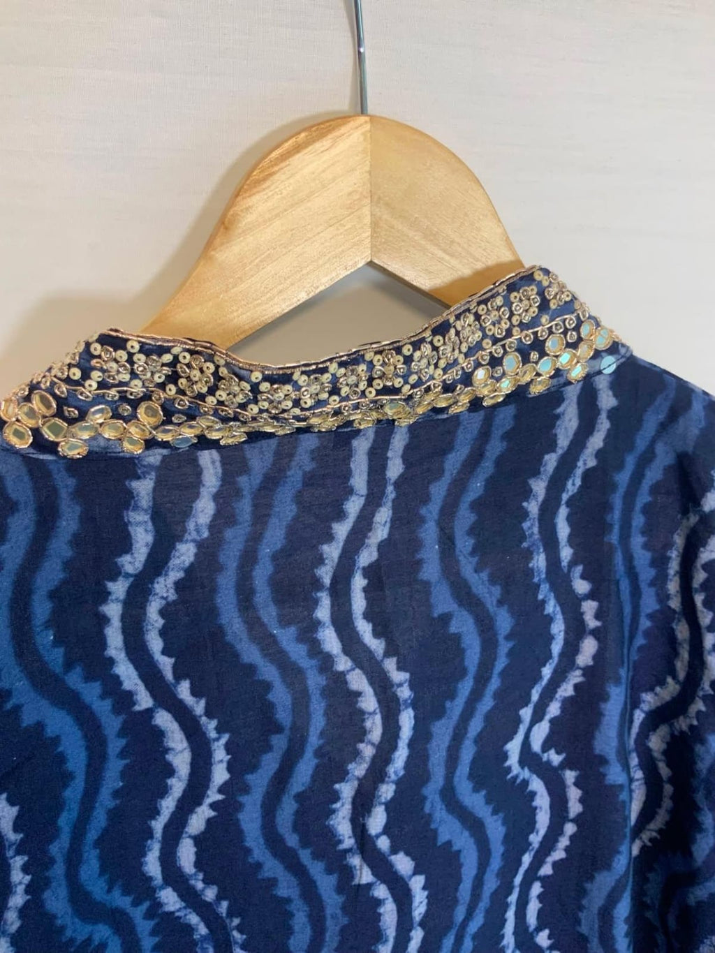 Women's Navy Blue Printed Kurta Set with Embellished Neckline