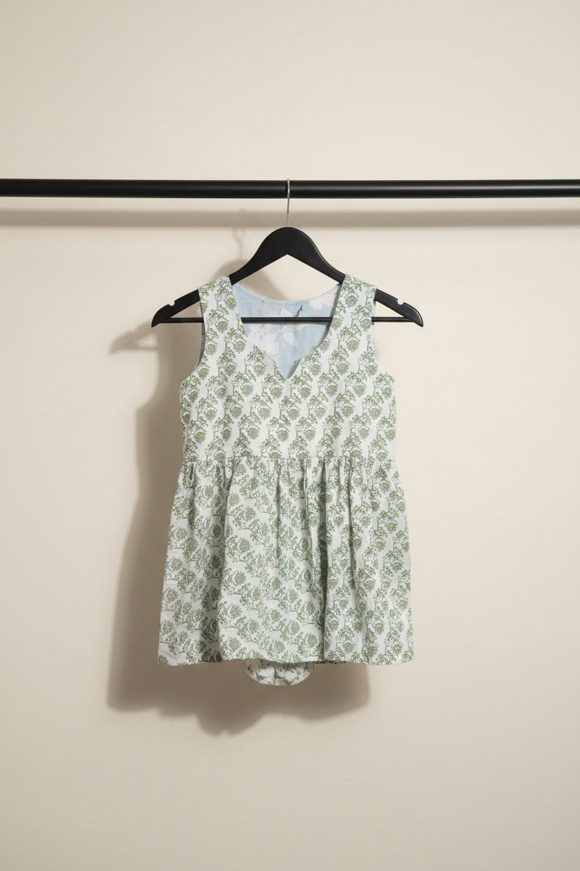 White Printed Sleeveless Peplum Top