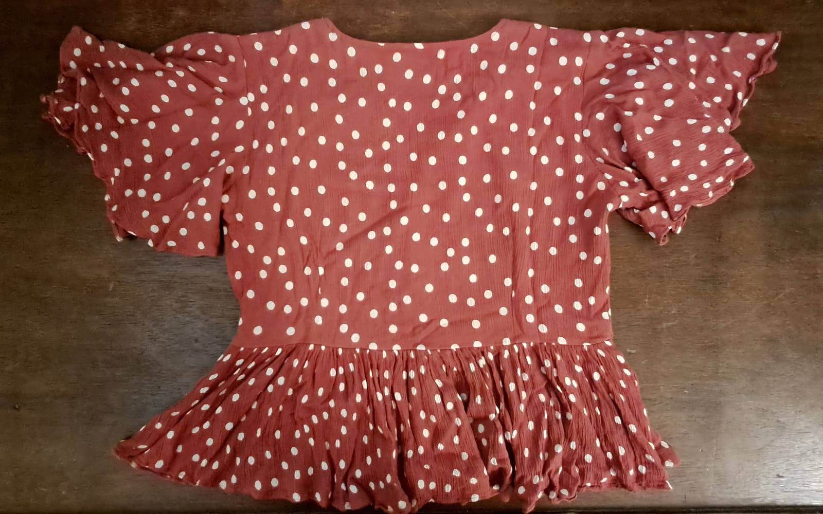 Women's Rust Polka Dot Peplum Top with Ruffle Sleeves