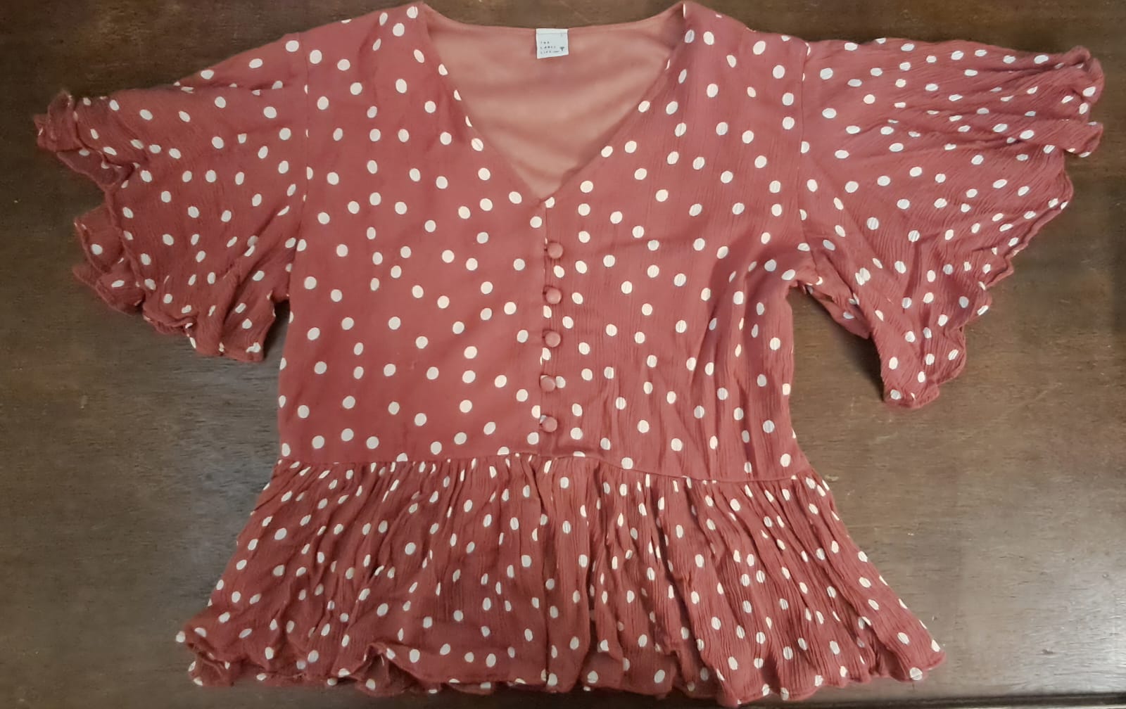 Women's Rust Polka Dot Peplum Top with Ruffle Sleeves