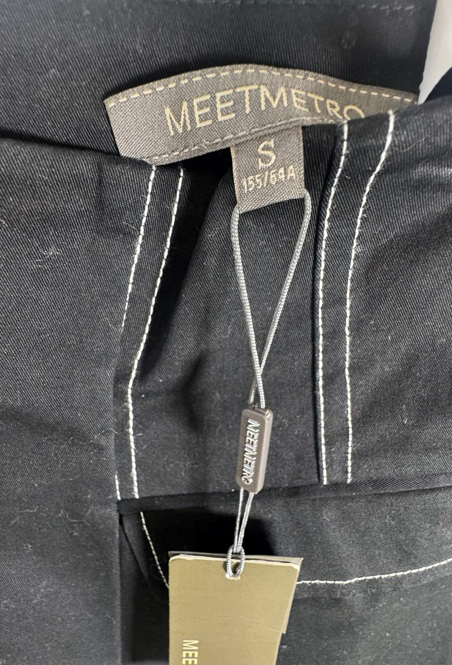 MEETMETRO Black Mini Skirt with White Stitching Detail