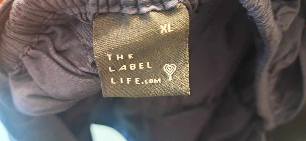 The Label Life Black Ruffled Sleeveless Fit and Flare Dress