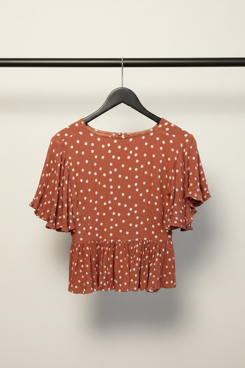 The Label Life Rust Polka Dot Peplum Top